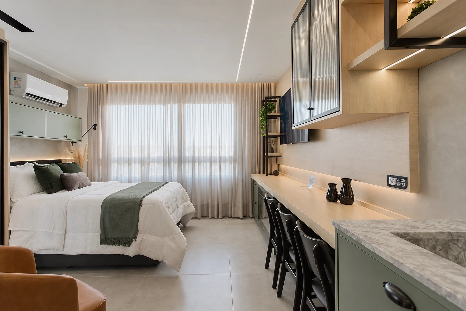Vista do Studio 1613: cama, bancada e cozinha.